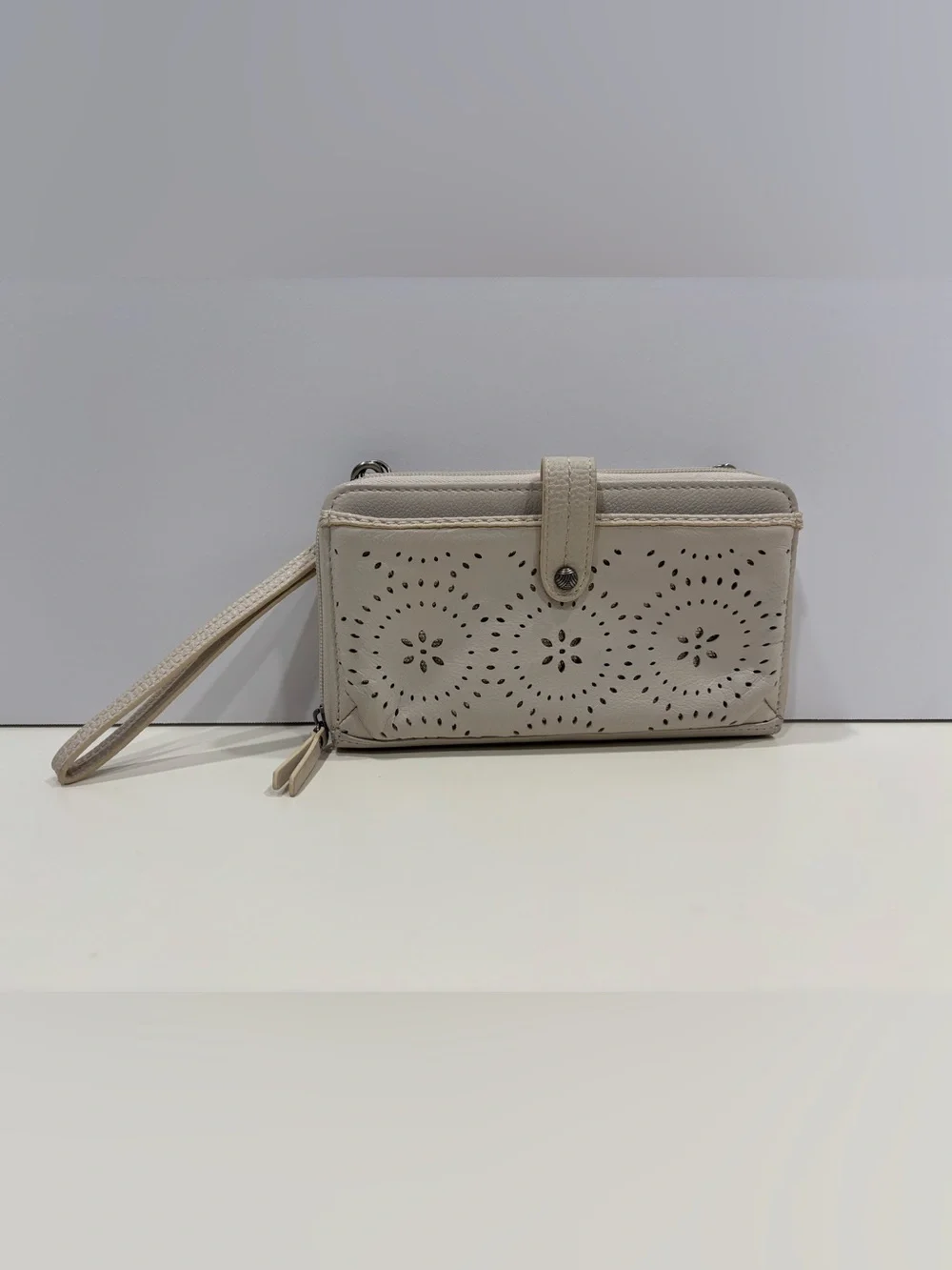 The Sak Light Cream Wristlet Clutch